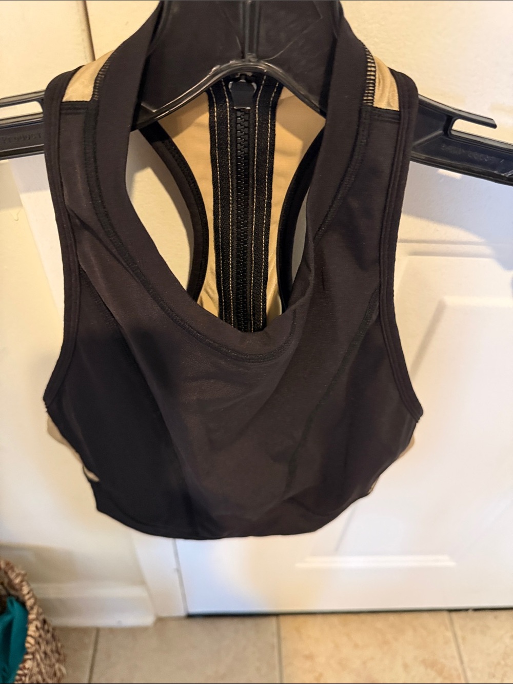 Alala Black Sports Bra with Nude Back Panel and Zip Detail